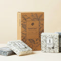 NatureLayer soap packaging with brown box and soap bars on a beige background
